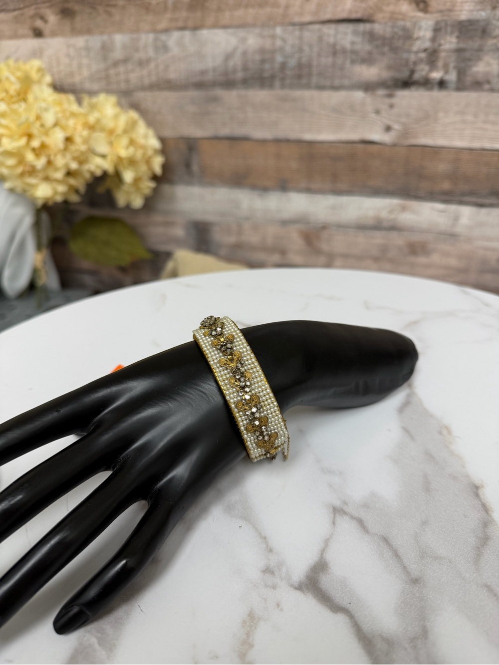Pearl and crystal embellished hinged bangle bracelet